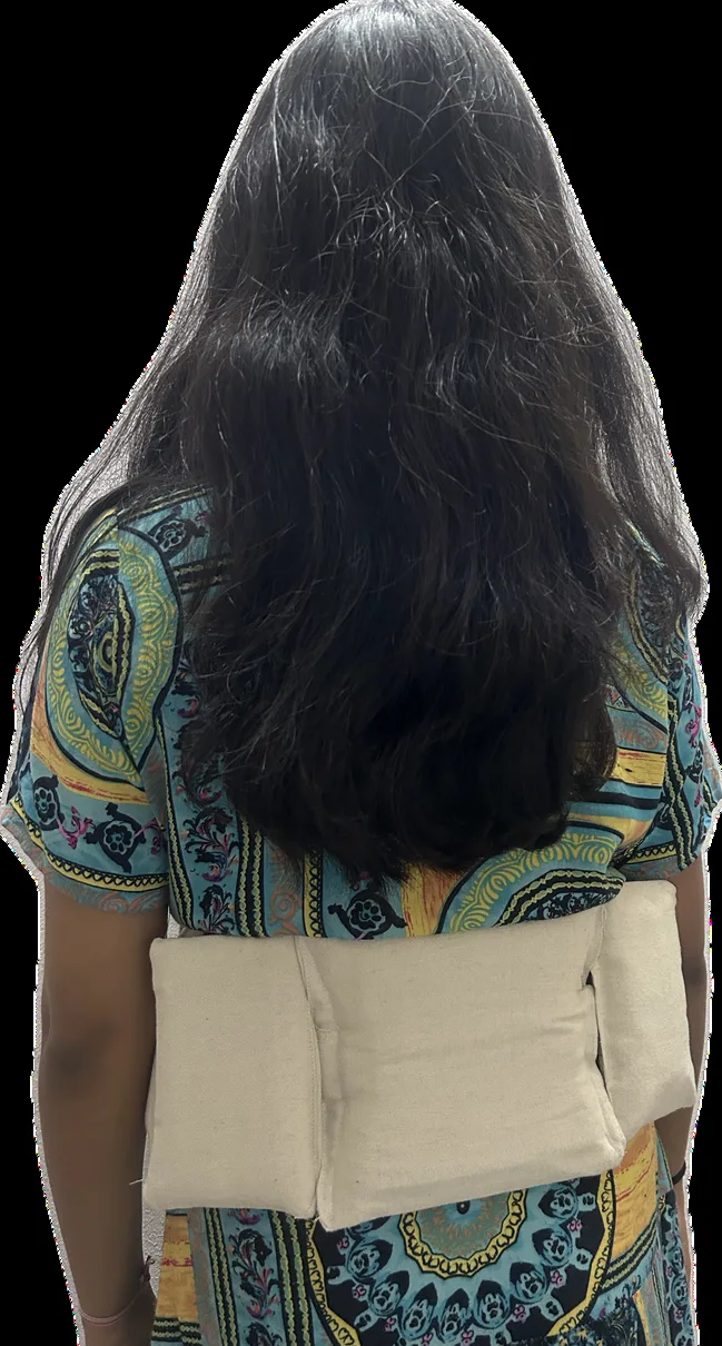 Another person wearing the prototype belt, back view