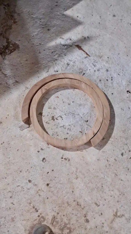 Teak ring sections on the workshop floor