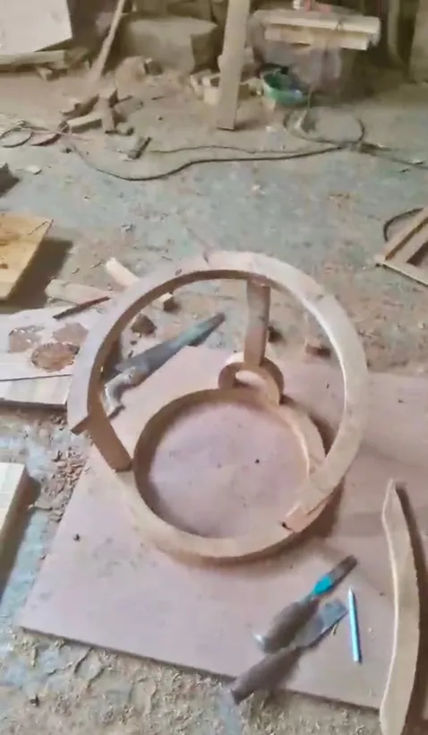 Ring, seat frame and spindles dry-fitted on a board
