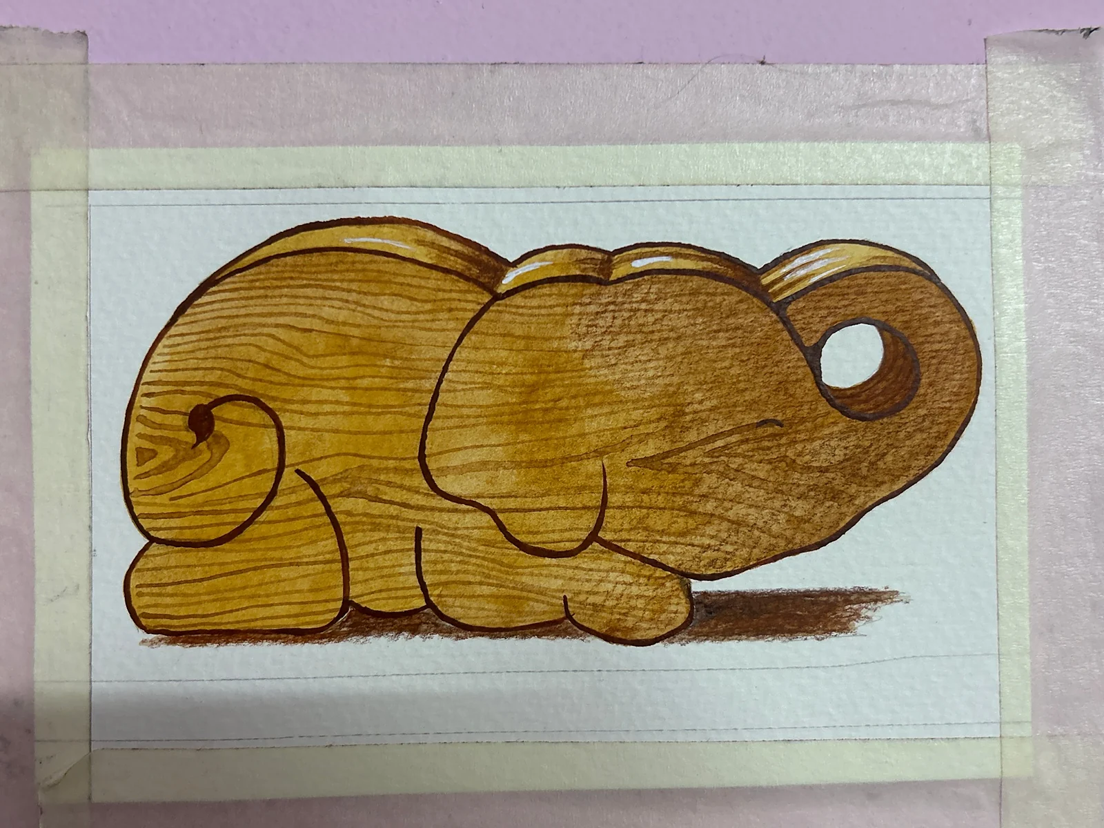 The final watercolour illustration of Ellie with wood grain and a brown outline, taped to the desk