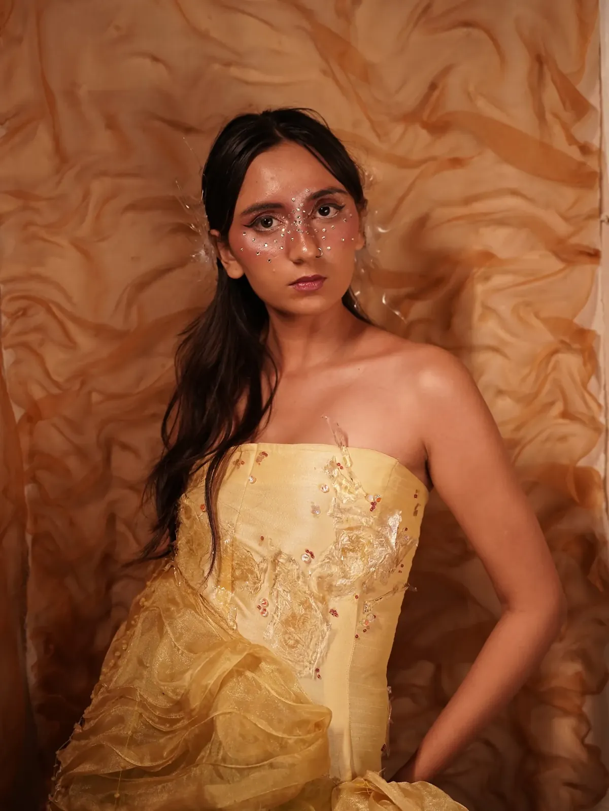 Portrait in the yellow corset against a crinkled organza backdrop
